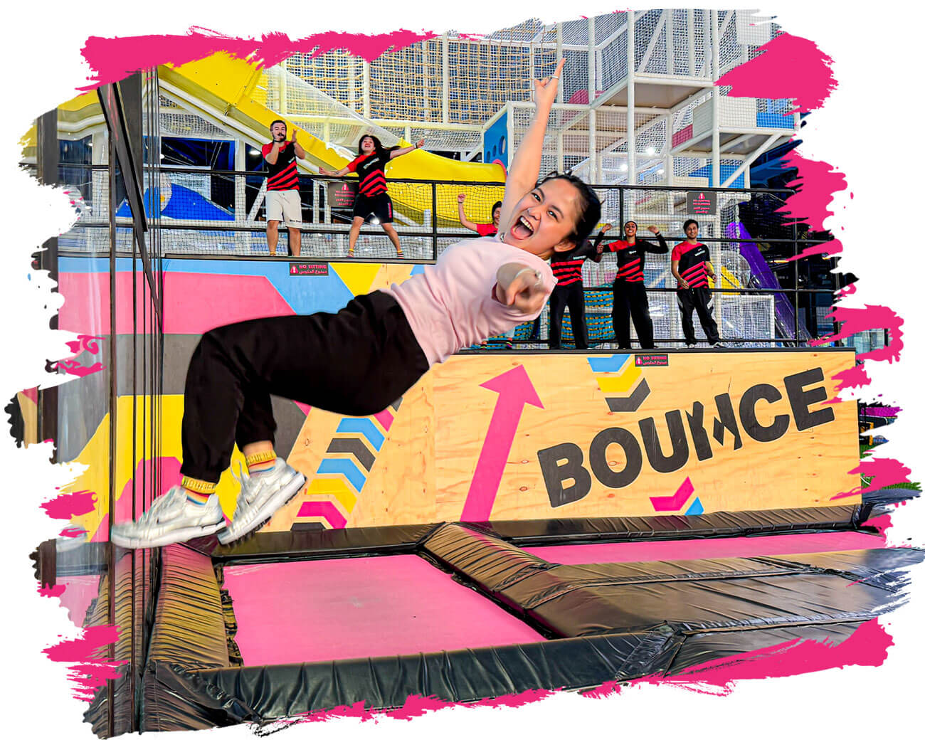 Girl jumping on the trampoline and doing wallrun at bounce showing bounce is more